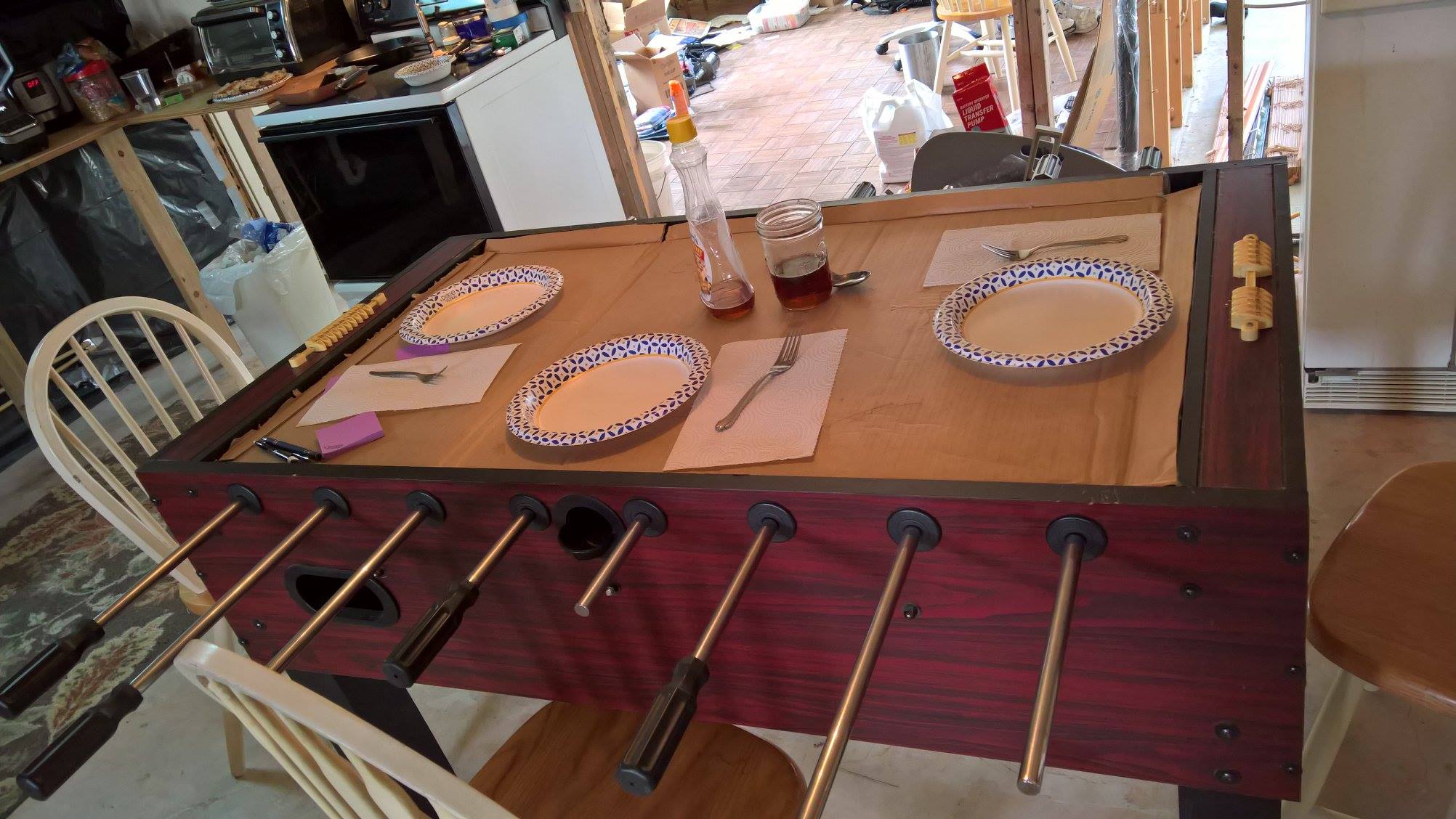 After the hurricane, we repurposed the foosball table to be a kitchen table. Nothing a little cardboard and ingenuity can't handle!